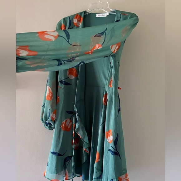 All In Favor Sheer Long Sleeve Mini Floral Tulip Wrap Dress - Picture 3 of 8